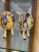 Two Ceramic Ostrich Eggs with African Animal Detail