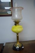 Victorian Brass Oil Lamp with Glass Reservoir on Black Ceramic Base