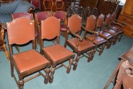 Five 1930’s Oak Dining Chairs and Two Carvers with Vinyl Upholstery