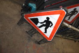 *Six Road Works Signs
