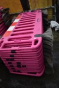 *Fifteen Pink-Plastic Barriers