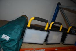 *Three Rechargeable Work Lights with One Charger and a Bag of Carbon Fibre Tent Poles