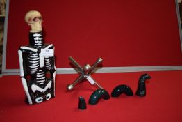 Novelty Skeleton Decanter, Aluminium Ornament, and a Loch Ness Monster Ornament