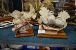 Pair of Armani Bird Figures on Wooden Bases
