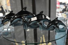 Four Poole Pottery Dolphins