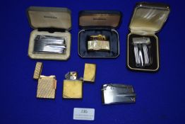 Six Vintage Lighters by Ronson and Zippo etc.
