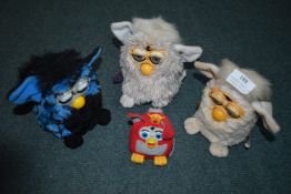 Three Furbies, and a McDonalds Mini Furby