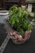 Planter with Squirel Design, and a Pieris