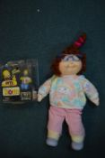Cabbage Patch Doll circa 1982, plus Home Simpson Figure
