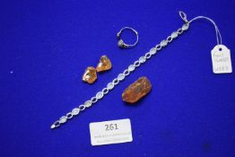 White Gold Plated Bracelet, Scrap Silver Ring, and Pieces of Amber