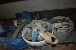 *Three Buckets and a Bag of Straps and Slings