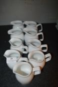 *Nine Milk and Cream Jugs
