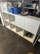 *White Storage Unit with Shelves and Drawers