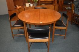 1970’s Mcintosh Teak Extending Circular Dining Table with Four Original Vinyl Upholstered Chairs