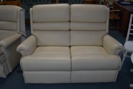 Sherbourne Cream Leather Manual Reclining Two Seat Sofa (matching previous lot)