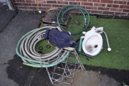 Porcelain Toilet, Plumbing, and a Gas Grill