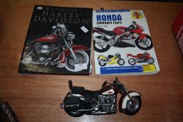 Model Harley Davidson Motorcycle, Harley Book, and a Honda Haynes Manual