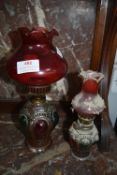 Two Coloured Glass Oil Lamps