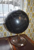 Black Terrestrial Globe on Wooden Plinth