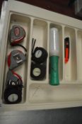 *Tray of Six Tape Measures, Box Cutter, and a Shrink Wrap Roller