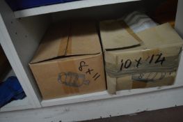 *Contents of Lower Shelves to Include Assorted Boxes Plastic Bags, and a Roll of Clear Pouches