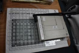 X Cut Cutting Mat plus Grids, and a Trimmer