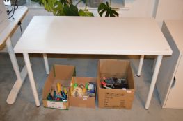 *White Table on Tubular Legs