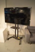 *Hisense 65” TV on Stand