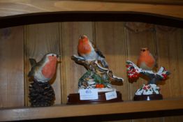 Three Pottery Christmas Robin Decorations