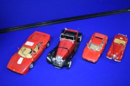 Four Burago Diecast Model Cars (AF)