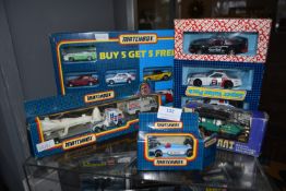Four Matchbox Diecast Vehicle Sets Including NASA
