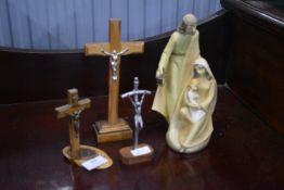 Three Crucifixes and a Religious Figure