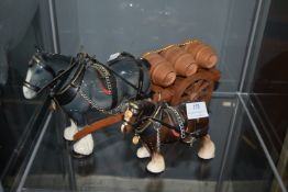 Two Pottery Cart Horses