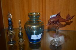 Coloured Glass Vases, Bottles, and a Dolphin