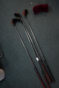 Four Golf Clubs by Ping