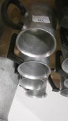 *Four Small Aluminium Jugs