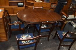 Oval Extending Dining Table with Six Floral Uphols