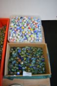 Two Tubs of Marbles