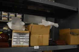 *Contents of Shelf to Include Assorted Post Caps