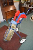 Golf Trolley with Clubs and Umbrellas