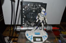 Star Wars Clone Wars Clock Radio plus Lightsabre and a Star Wars Book