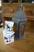 Lantern and a Decorative Candle