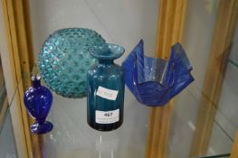 Four Blue Glass Vases and Bowls
