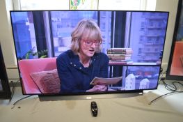 LG OLED 55” Smart TV with Remote (working condition)