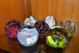Seven Glass Paperweights by Caithness and CG
