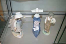 Two Nao and One Lladro Figures