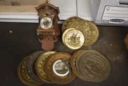 Ornate Wall Clock with Brass Roman Numeral Dial, and a Quantity of Brass Embossed Plates
