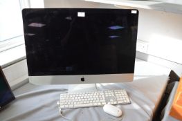 Apple Computer with Keyboard and Mouse