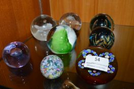 Eight Glass Paperweights by CG and Medina