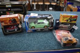 Six Diecast Cars by Matchbox, Maisto, etc.